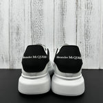 Alexander McQueen Black and White Drip Sneakers