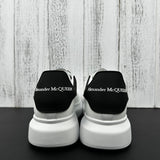 Alexander McQueen Black and White Drip Sneakers