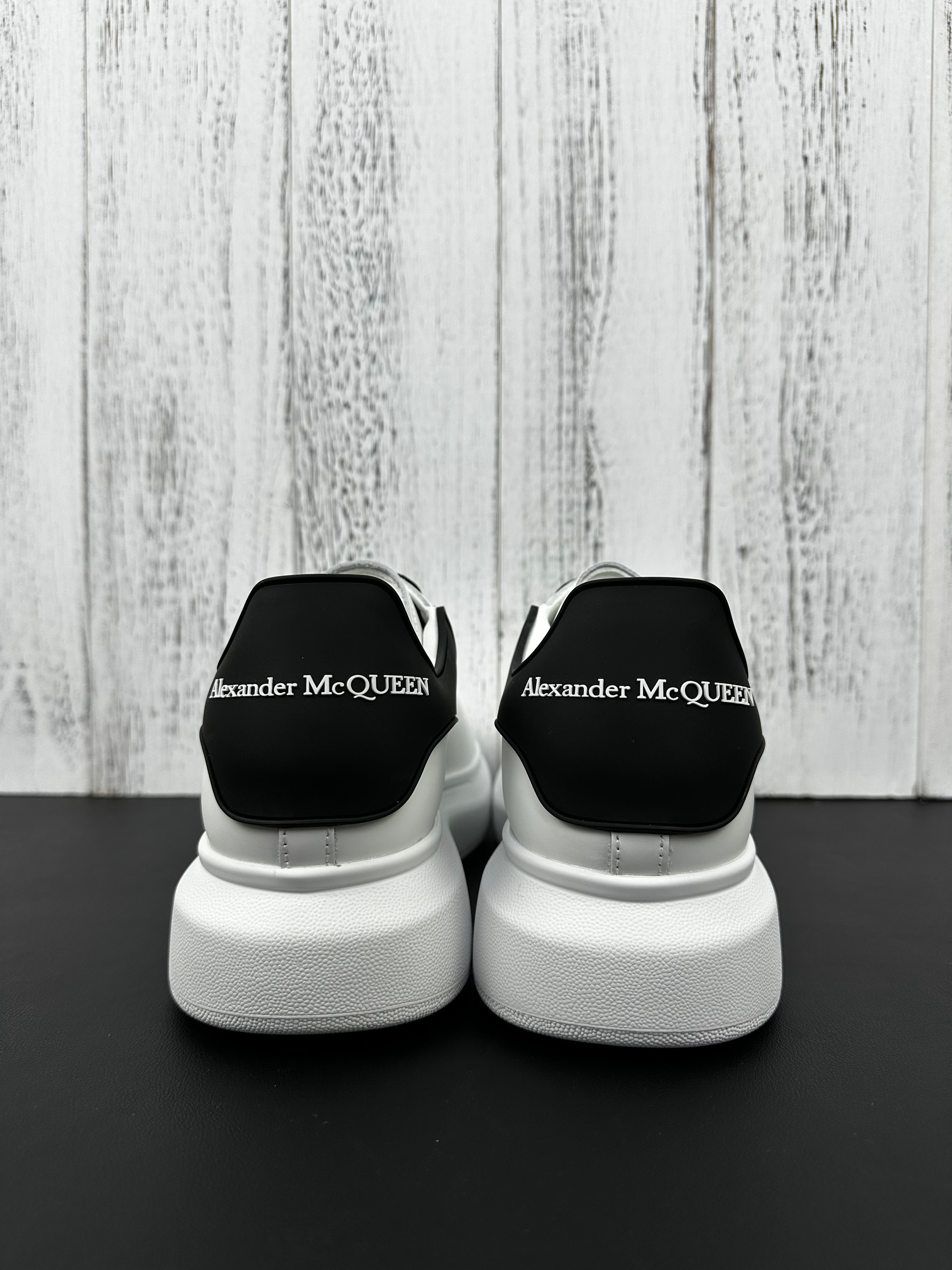 Alexander McQueen Black and White Drip Sneakers