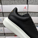 Alexander McQueen Black & White Drip Sneakers