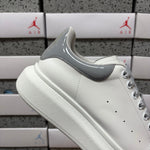 Alexander McQueen Metallic Silver Drip Sneakers