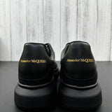 Alexander McQueen All Black Drip Sneakers