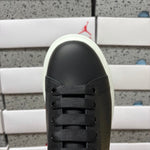 Alexander McQueen Black & White Drip Sneakers