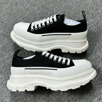 Alexander McQueen Black and White Drip Sneakers