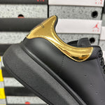Alexander McQueen Gold Black Drip Sneakers