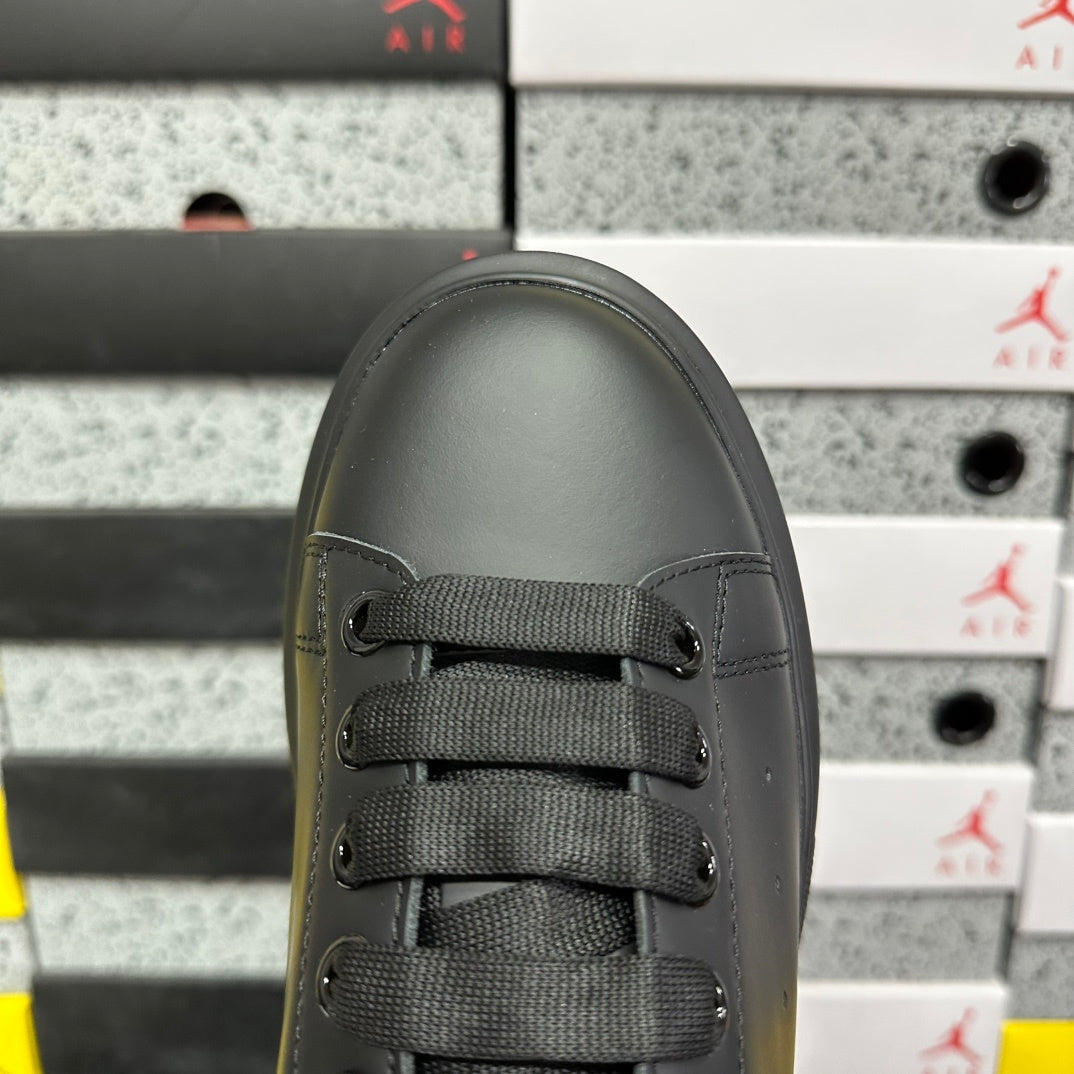 Alexander McQueen Gold Black Drip Sneakers