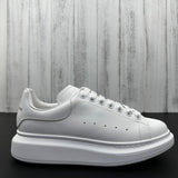 Alexander McQueen All White Drip Sneakers