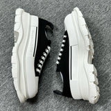 Alexander McQueen Black and White Drip Sneakers