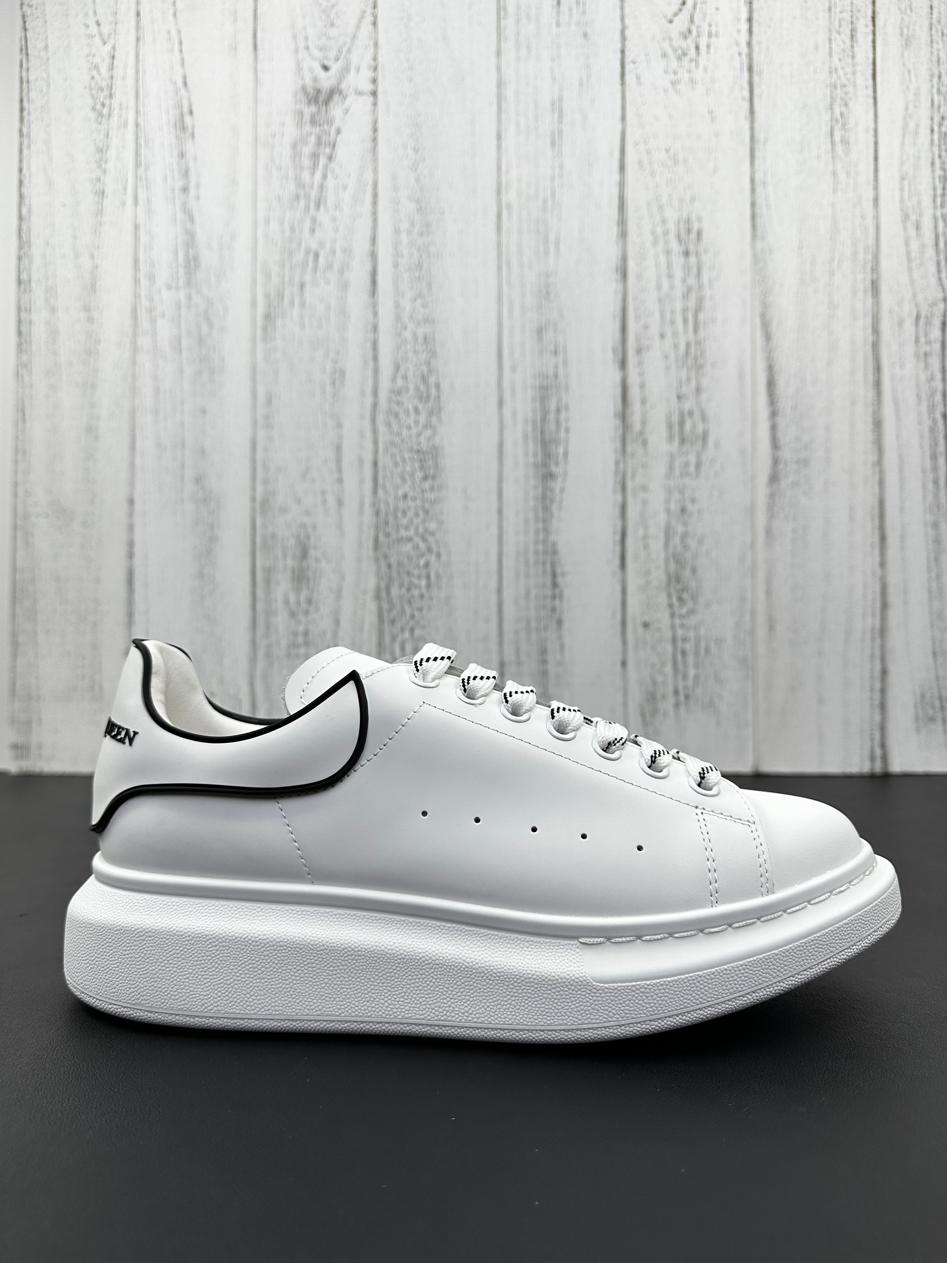 Alexander McQueen White and Black Drip Sneakers
