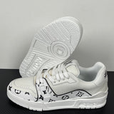 Trainer White Monogram