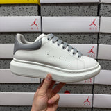 Alexander McQueen Metallic Silver Drip Sneakers