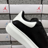 Alexander McQueen Black & White Drip Sneakers