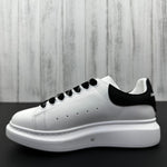 Alexander McQueen Black and White Drip Sneakers
