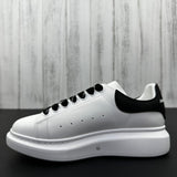 Alexander McQueen Black and White Drip Sneakers