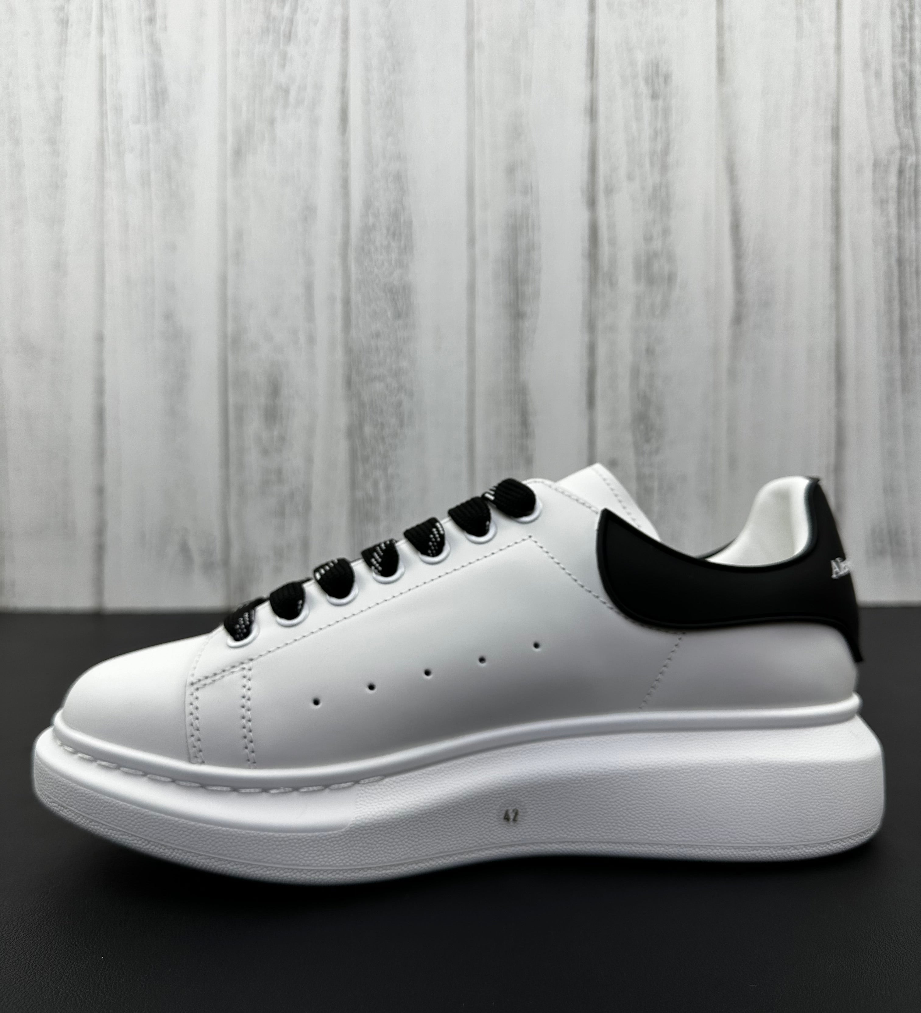 Alexander McQueen Black and White Drip Sneakers