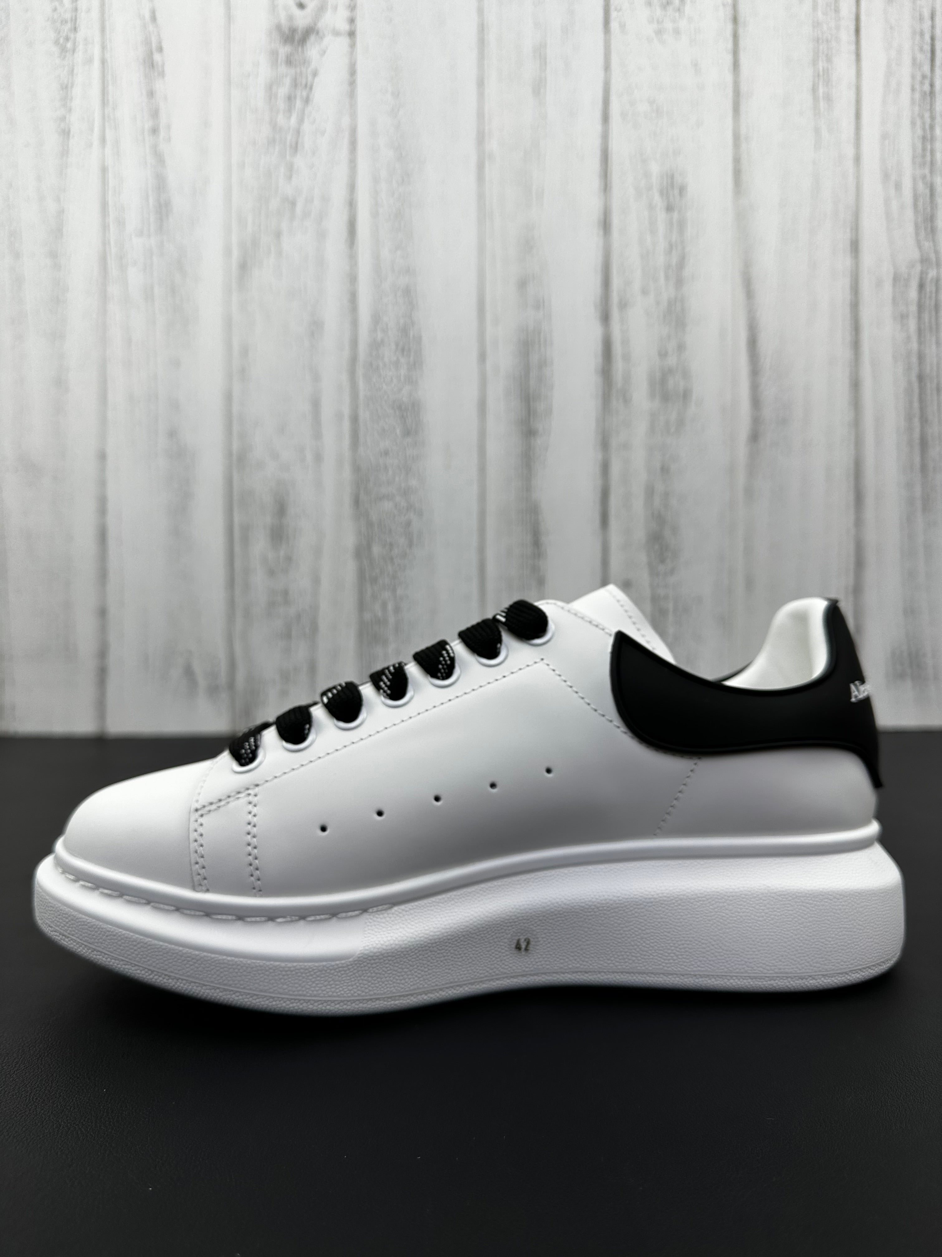 Alexander McQueen Black and White Drip Sneakers