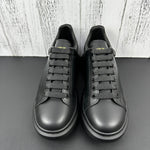 Alexander McQueen All Black Drip Sneakers