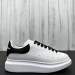 Alexander McQueen Black and White Drip Sneakers