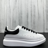 Alexander McQueen Black and White Drip Sneakers