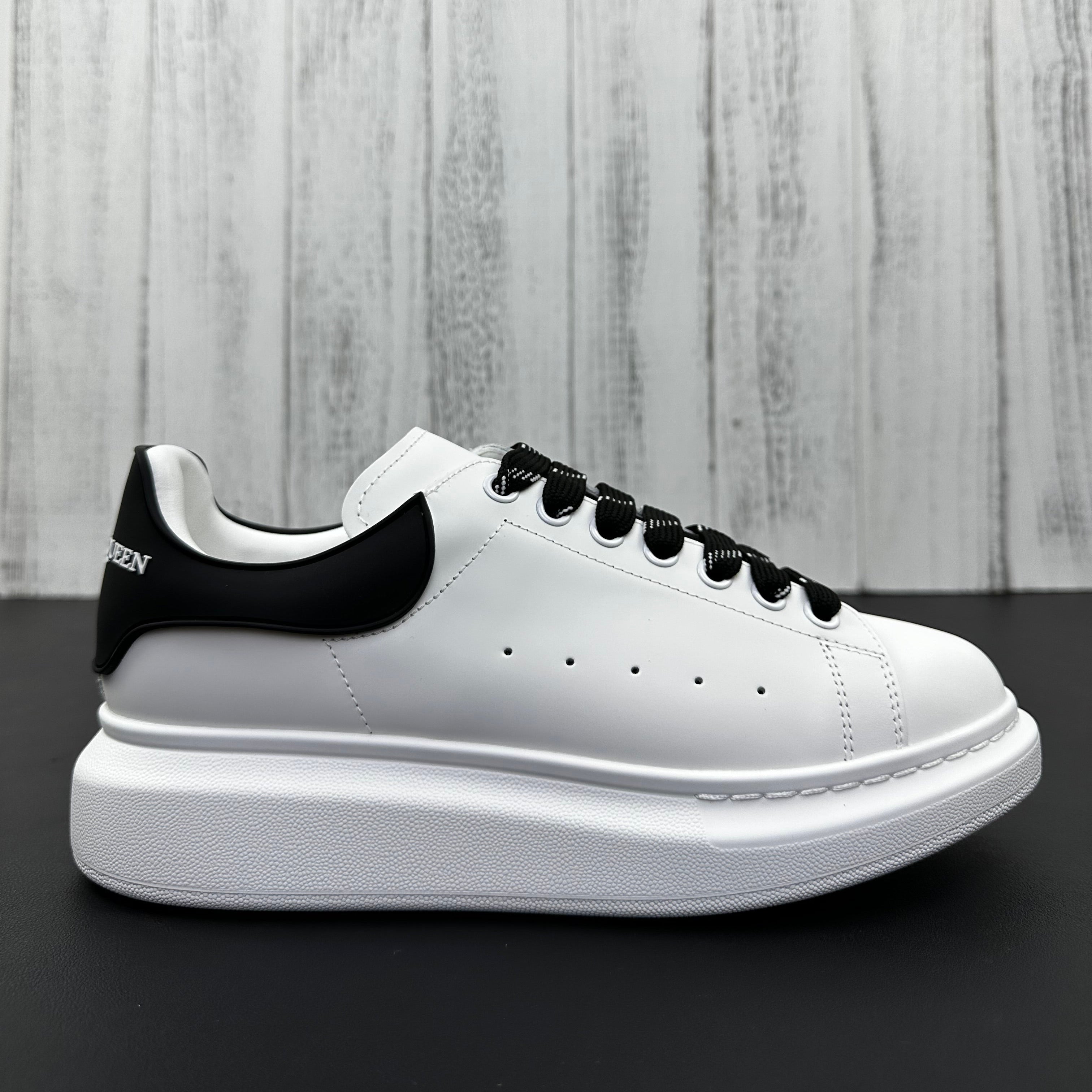 Alexander McQueen Black and White Drip Sneakers