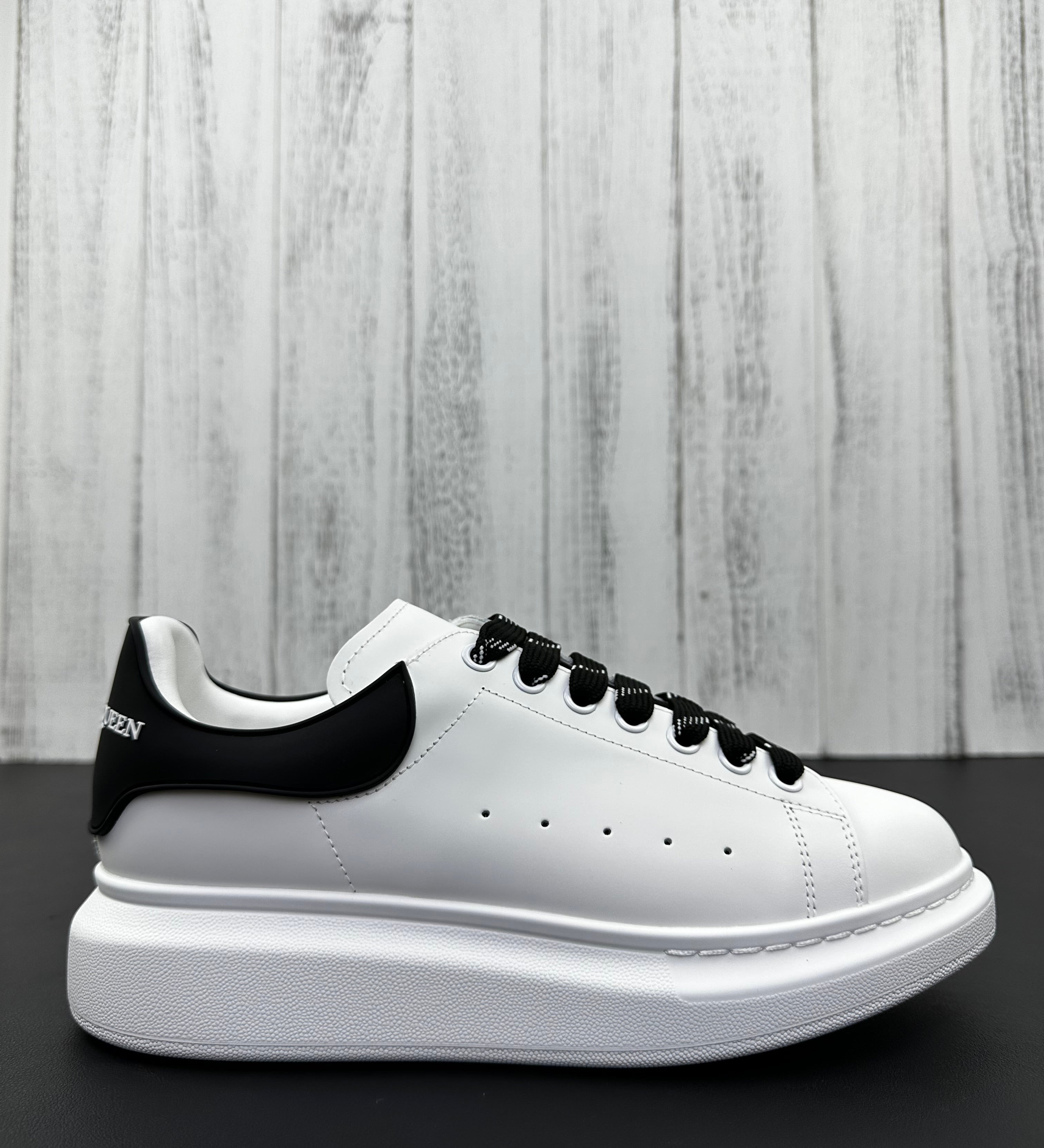 Alexander McQueen Black and White Drip Sneakers