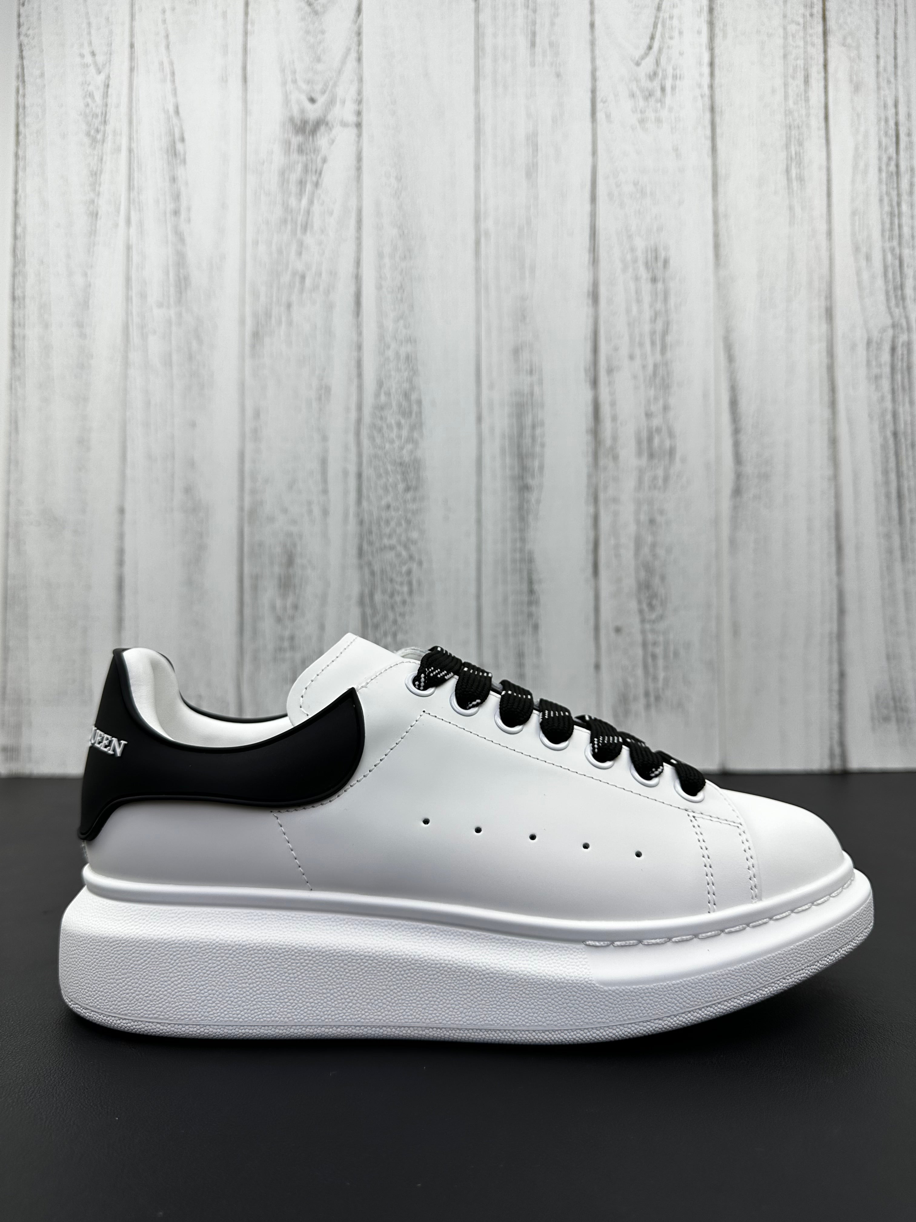 Alexander McQueen Black and White Drip Sneakers