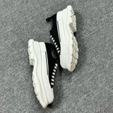Alexander McQueen Black and White Drip Sneakers