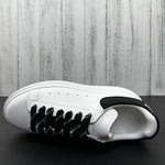 Alexander McQueen Black and White Drip Sneakers