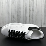 Alexander McQueen Black and White Drip Sneakers