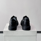 Alexander McQueen Oversized Black Drip Sneakers
