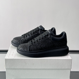 Alexander McQueen Oversized Black Drip Sneakers