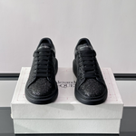 Alexander McQueen Oversized Black Drip Sneakers