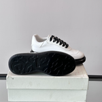Alexander McQueen Oversized White/Black Drip Sneakers