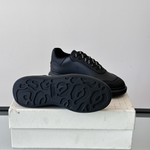 Alexander McQueen Oversized Black Drip Sneakers