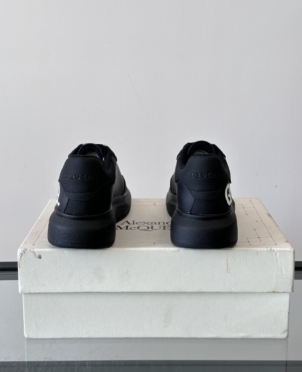 Alexander McQueen Oversized Black Drip Sneakers