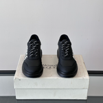 Alexander McQueen Oversized Black Drip Sneakers