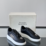 Alexander McQueen Oversized White/Black Drip Sneakers