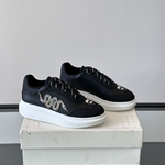 Alexander McQueen Oversized White/Black Drip Sneakers