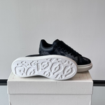 Alexander McQueen Oversized Black/White Drip Sneakers