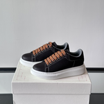 Alexander McQueen Oversized White/Black Drip Sneakers