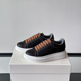 Alexander McQueen Oversized White/Black Drip Sneakers