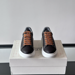 Alexander McQueen Oversized White/Black Drip Sneakers