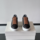 Alexander McQueen Oversized White/Black Drip Sneakers