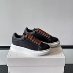 Alexander McQueen Oversized White/Black Drip Sneakers