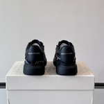 Alexander McQueen Oversized Black Drip Sneakers