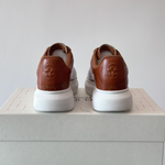 Alexander McQueen Oversized White/Orange Drip Sneakers