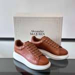 Alexander McQueen Oversized White/Orange Drip Sneakers
