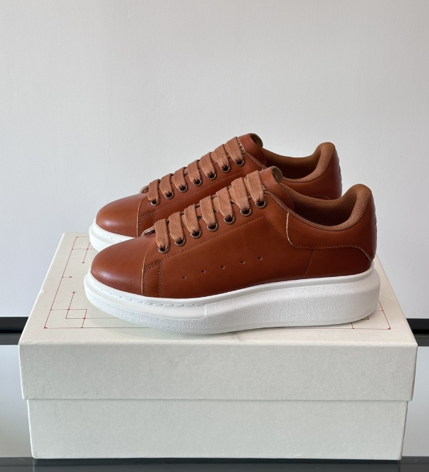 Alexander McQueen Oversized White/Orange Drip Sneakers