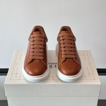 Alexander McQueen Oversized White/Orange Drip Sneakers