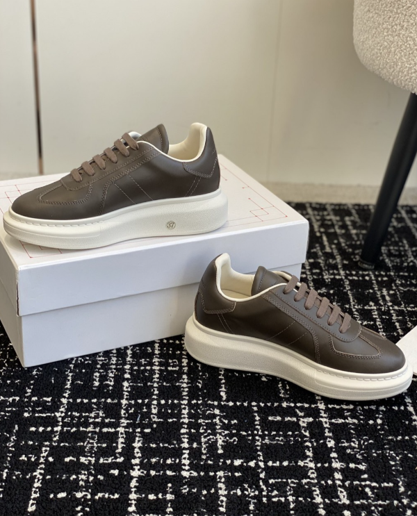 Alexander McQueen Oversized Brow Drip Sneakers